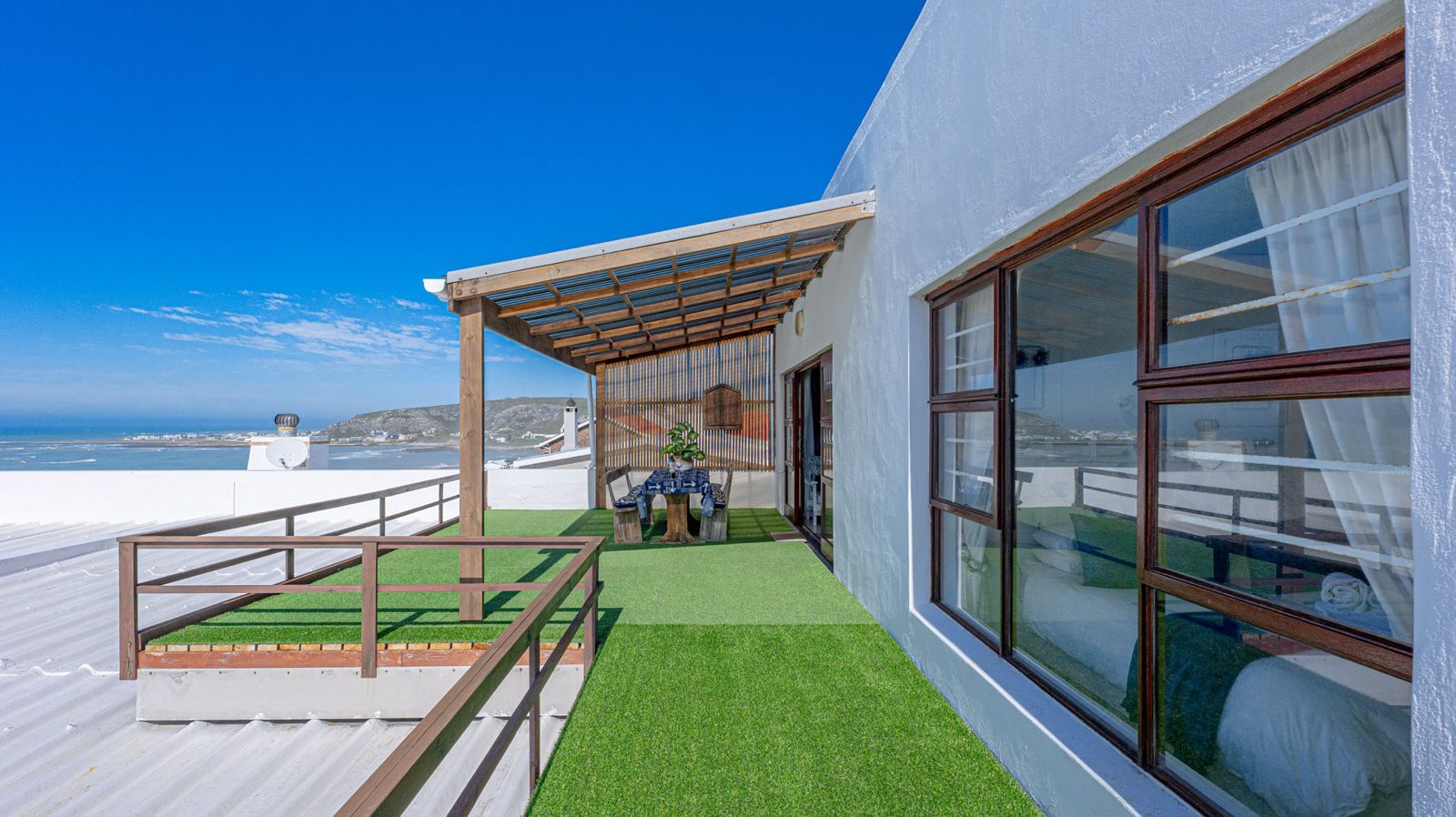 Blue Whale balcony along the bedroom windows